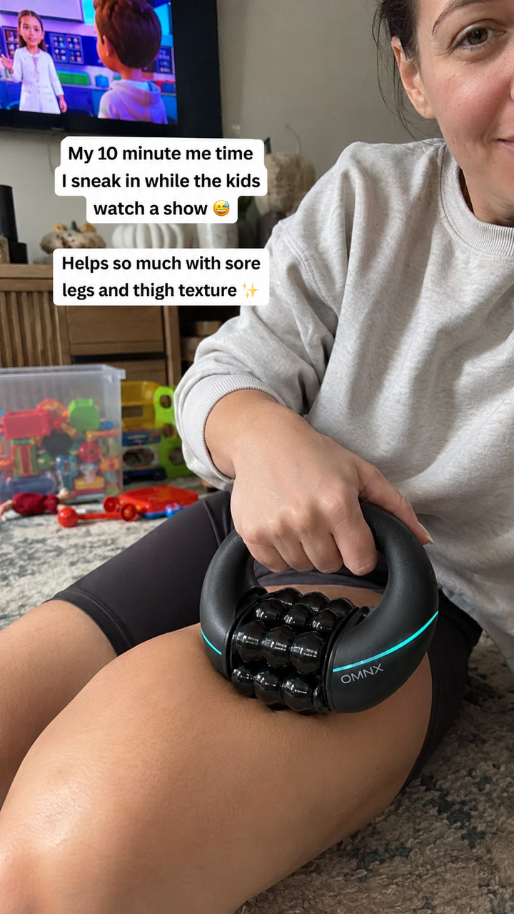 Tall: massager in use on thigh